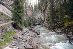 02 Walking Up Boardwalk Next To Johnston Creek Towards Lower Falls In Johnston Canyon In Summer